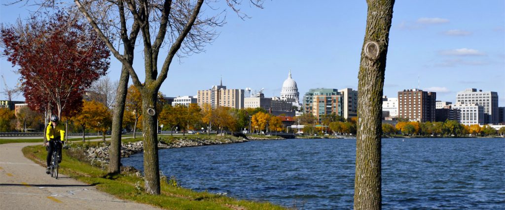 The Madison Wisconsin Capitol building seen across Lake Monona from the Capital City State Trail.