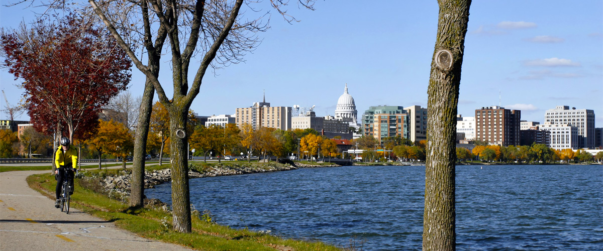 The Madison Wisconsin Capitol building seen across Lake Monona from the Capital City State Trail.