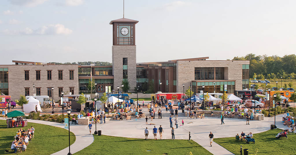 The drexel town square in oak creek wisconsin during a busy community event.