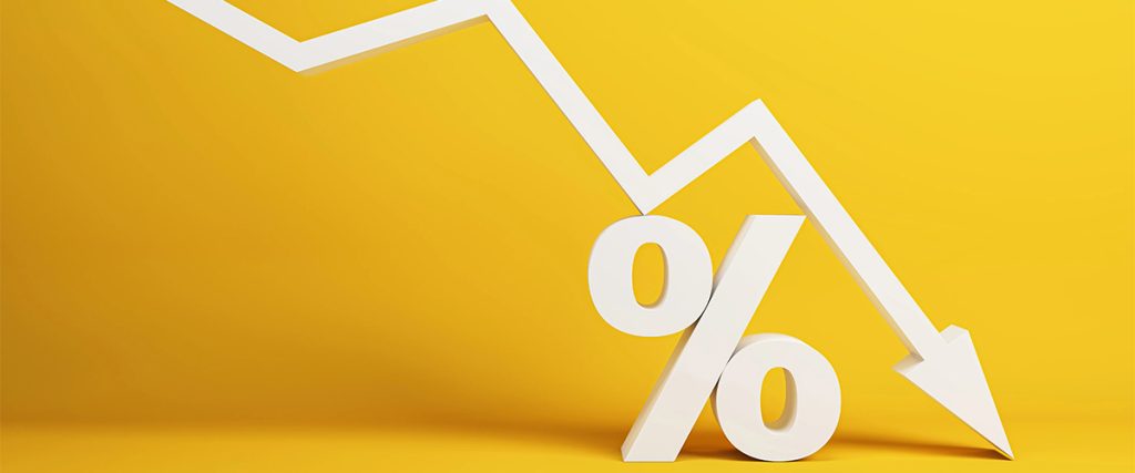 A downward trending arrow over a percentage sign symbolizing falling mortgage rates.