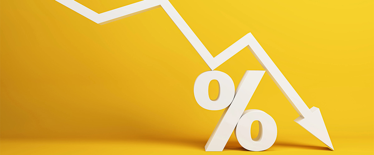 A downward trending arrow over a percentage sign symbolizing falling mortgage rates.